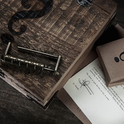 J.J. Abrams and Theory11 team up to create the Mystery Box, handcrafted box from 100 year old reclaimed wood, and Bad Robot playing cards.