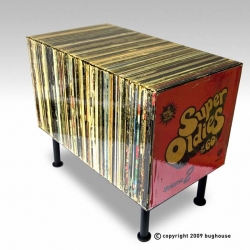 Amazing vinyl art coffee table by bughouse. Definitely a conversation piece.