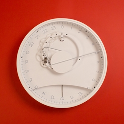 Slowclock is a 24 hour wall clock with a single needle, designed by factil and Mercé Núñez. The entire mechanism integrated within the sphere, crowned by a font designed specifically for this clock.