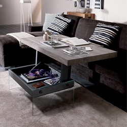 Bellagio is a transformable coffee-table with metal structure, wooden upper top in two-heights (cm 32>cm 65) and glass feet. Self-braking gas-lifting device. Made in Italy. Designed by Ozzio Design