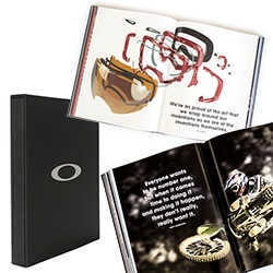 Oakley! The book - published by Assouline. "...get to know the real story behind Oakley, a company dedicated to—and driven by—cutting-edge vision." All in a black rubber slipcase with metal ellipse Oakley logo