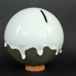 ORB, quaint coin banks beautifully hand made earthenware with small town artisan personality. Each one sealed with a tender cork at the base, also serves as a stand. By Anders Arhoj.