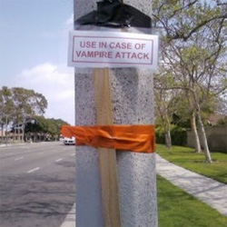 Fun user submitted photo collection at the LATimes of "Weird Warnings" ~ i like this "Use in case of Vampire Attack" sign with a stake taped to a pole.