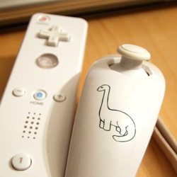 This 25th year ~ my perfect birthday present is my new Vinyl Cutter ~ and to test it out between ai files and doodles, we have even decorated the wiimotes! [this image is just the beginning]