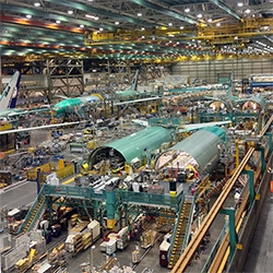 Boeing Factory Tour in Everett, WA just outside of Seattle is a definite must see in person when in the area. The sheer scale of the space and the planes and the factory in motion is mind blowing.