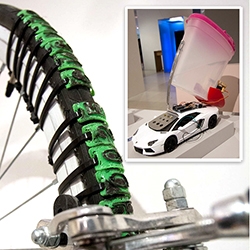 Streettoolbox by Pierre Paslier from the RCA Innovation Design Engineering. It includes a sticker-applying drone, a car that can draw with salt, bike tire stamps, and magic-pen style graffiti that is revealed by a portable projector.