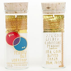 Yellow Owl Pendants are adorably packaged in corked glass vials... this is the You + Me Venn Diagram