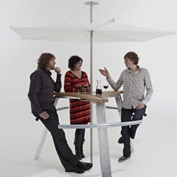 Abachus outdoor table includes six fixed arms that you can lean against instead of using chairs.