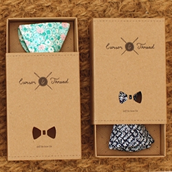 Cursor and Thread has a nice bow tie gift box designed by Ooco Design - love seeing the packaging design and iBox custom dies behind it all.