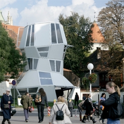 This temporary pavilion in the center of Zagreb was designed by the local ofice njiric+ arhitekti, and it was opened during the 44 Architecture Salon. The leaning  bars give the structure a dynamic look as you look it from different angles.
