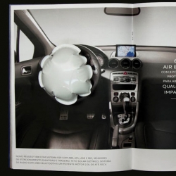 Peugeot makes a airbag inflate in a magazine ad. Hit the car... and POOF.