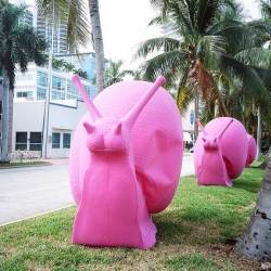 Giant pink snails have invaded Miami! Still, don't panic - it isn't a Bmovie come to life it's the latest installation by groovy Italian artsters CAG.