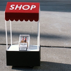 Tiny remote-control pop-up Shop zooms around the streets of Harajuku, Tokyo.
