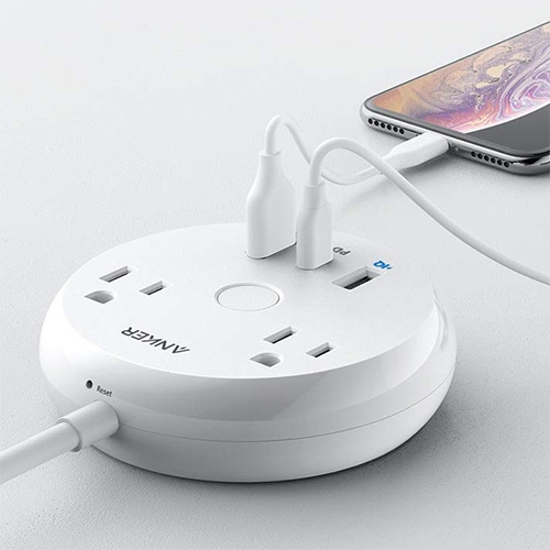 Anker USB-C Power Strip has 2 Outlets, 2 USB-A, and 1 USB-C. It's a 4" power puck perfect for our couch, especially since the USB-C allows for super charging my iPhone (~1%/min!), also great for travel.