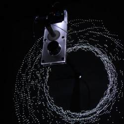 Radius Music by Dave Young (henderson) makes sound from cartography. The revolving machine reads the distance between itself and surrounds. As it rotates, it outputs distance as a relative sonic frequency and a corresponding visual score.