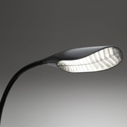 Designer Karim Rashid has designed a lamp inspired by a leaf blowing in the wind for Italian brand Artemide.