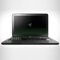 The Razer Blade Laptop is thinner than a 17 inch MacBook Pro and boasts a 17.3 inch LED-backlit display and a touch-enabled LCD panel next to the keyboard (Switchblade UI).