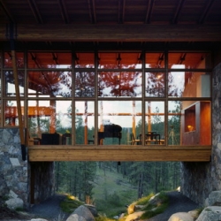 Gorgeous house by Tom Kundig. The house is essentially a collection of attached wood boxes springing from three stone piers that bridge the natural undulations of a hill.