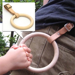 Wood ring on a leather strap ~ it looks like a subway ring for kids to hold on to just about anywhere...