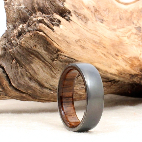 Wedgewood Rings - The metal portion of this ring is made from the ejector nozzle of an SR-71 Blackbird.  The wood inner portion is teak reclaimed from the deck of The USS North Carolina (BB-55).