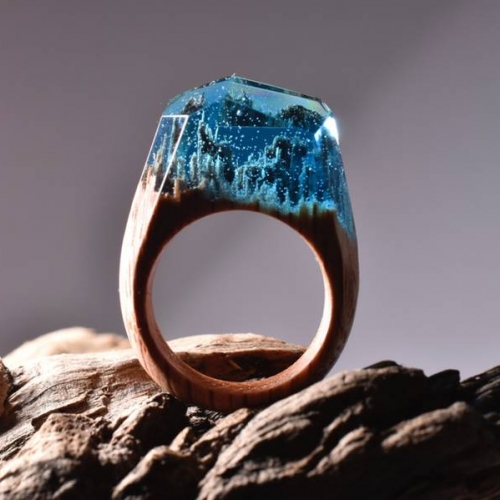 Secret Wood's wooden rings with magnificent tiny fantasy landscapes