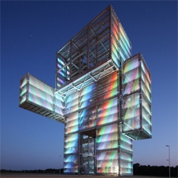 German based  Maurer United Architects [MUA], recently completed this robot like structure in Inden. A LED skin results in an ever changing image of the static robot.