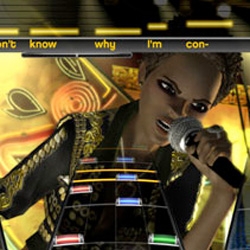 Rock Band 2 game modifier screen -  enter in the original Rock Band unlock code - Red, Yellow, Blue, Red, Red, Blue, Blue, Red, Yellow, Blue - *poof* Rock Band 2 song list is all yours...