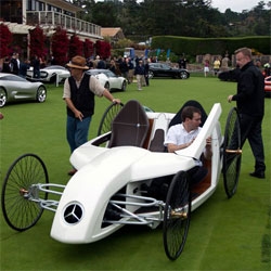 Fascinating to watching the joystick controlled bicycle buggy of an f-cell roadster concept from Mercedes-Benz get rolled around to get in to place on the putting green at Pebble Beach.
