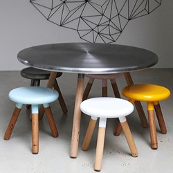Glenn and Justin Lamont from LifeSpaceJourney, have designed a set of milking stools and matching table with shaped spun metal tops.