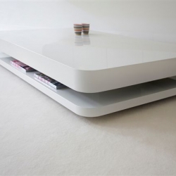 Love to hug your coffeetable? No sharp edges on this retro looking design from the new label Odesi.... [Editor's Note - it looks like a giant apple airport extreme]