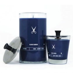 The Blind Barber teams up with JOYA to create a small capsule collection of artisanal candles and fragrances. The candles come in a midnight blue colorway in stainless steel Barbicide glass jars used by barbers. 