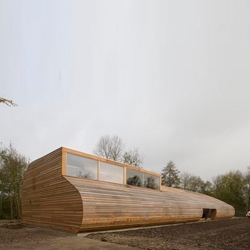 Sheepstable by 70F Architecture - A curved sheepstable in he city of Almere with steel girders and wood cladding. A small but very nice piece of architecture