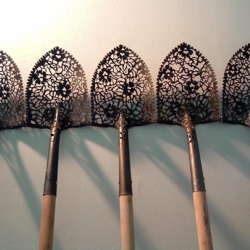 I never thought I would refer to a shovel as "stunning" . . . until now.

Cal Lane's work at the Foley Gallery.