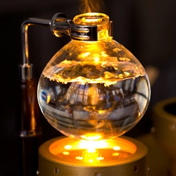 Think you're a coffee connoisseur? Meet the only super fancy $20,000, halogen-powered Japanese siphon bar coffee maker currently in the United States. It's like a coffee maker for a mad scientist