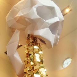 Beautiful giant paper skull installation in Macau, C Space by Hong Kong paper craft duo Stickyline.