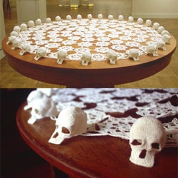 Look at this insane crocheted table cloth with skulls on the edges... By Hildur Bjarnadottir 1999