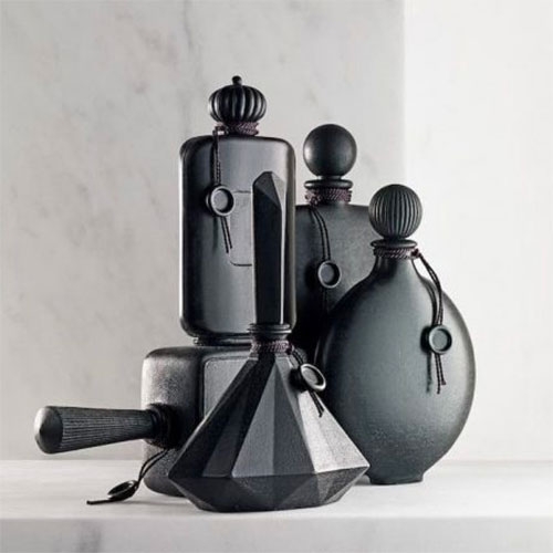 Perfume Bottle Soaps - black soap in the shape of perfume bottles.