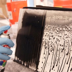 SLIPS (Self-healing, Slippery Liquid-Infused Porous Surface), a synthetic material that utilizes nano/ microstructured substrates, capable of repelling just about anything you can throw at it. Created at Harvard's Wyss Institute.