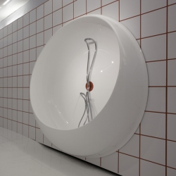 Ron Arad's bath for Teuco is wall mounted, and can be rotated to become a standing shower. And i guess the drain is just somewhere on your bathroom floor???