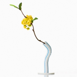Clever little vase based on those fun bendable straws. While not quite suitable for a bouquet, it will certainly add a nice floral highlight to a table...$12.00

