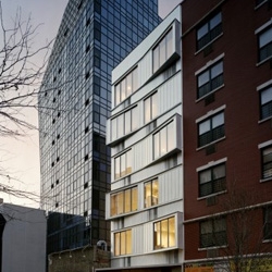 n Architects designed this nice building with cool bow windows. It's located right next to Tschumi's Blue Condo in NYC.