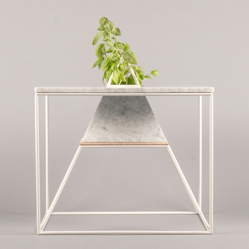 SPUTNIK-5 coffee table by Maxim Scherbakov is a coffee table and a capsule for herbs or flowers inspired by the Soviet cosmic satellite which was the first to put living objects including plants in an orbit and to bring them back to Earth.