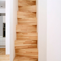 TAF Arkitektkontor had designed this low budget staircase, made out of stacked pine boxes. The opening between the ground floor and the attic was too narrow to construct a regular stair so they were forced to come up with a a better solution.