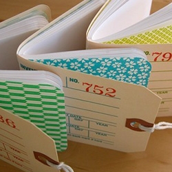 Mini sketchbooks made from inventory tags!  Each one is individually screen printed and stamped with a number.