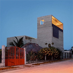 The TDA House in Mexico features a dissembled concrete volume that houses the interiors. Amazing terrace and hammocks on the top level, with great views of the ocean. By Cadaval & Solá Morales.