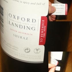 Pull-off tag on a wine bottle label .  I don't know who designed the label (short google session failed); this really is one of those small ideas that makes so much sense. Spotted on the Noisy Decent Graphics site.