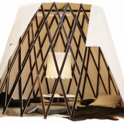 a presentation of the la melle lamp at Blickfang/Stuttgart2010. The lamp was hung in the middle of a tepee structure whose wooden lattice is partially exposed. (picture by tanja leonhard)