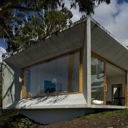 Heffernan Button Voss Architects have completed the Trial Bay House in Tasmania, Australia.