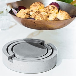 In.sek Concrete Trivet Set - Concrete nesting trivet set.   Three nested hand cast pieces that come apart to accommodate three hot pans or dishes when needed! (Also 30% off till Dec 3 with code CYBERMONDAY)