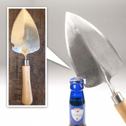 Sneeboer Transplanting Trowel with a bottle opener which has a 15 cm (6 in) blade and a cherry wood handle.
